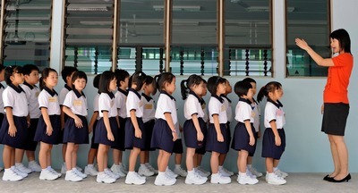 Школы Сингапура отказываются от рейтингов и уменьшают количество экзаменов